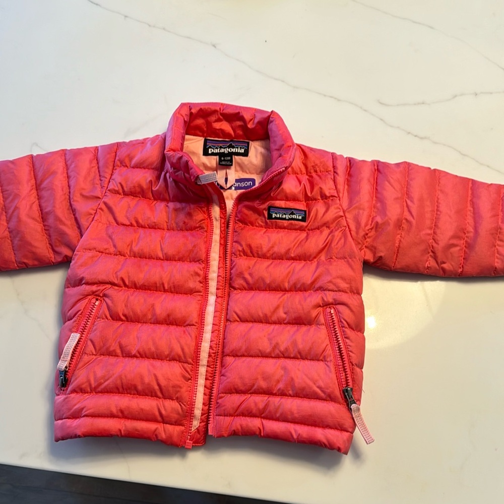 Baby Patagonia. Runs large. My kid wore it from 6 months until 18 months